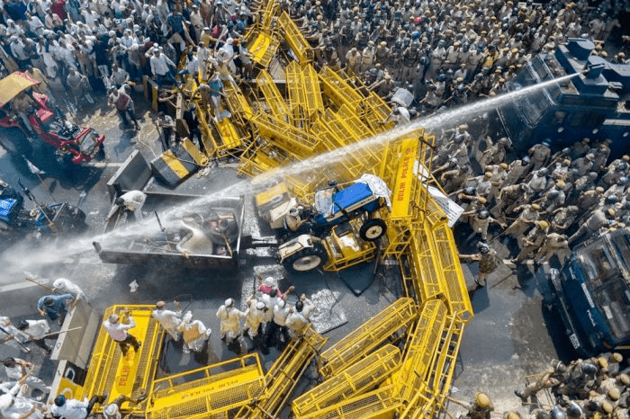 Police try to
disperse farmers protesting on the edge of New Delhi