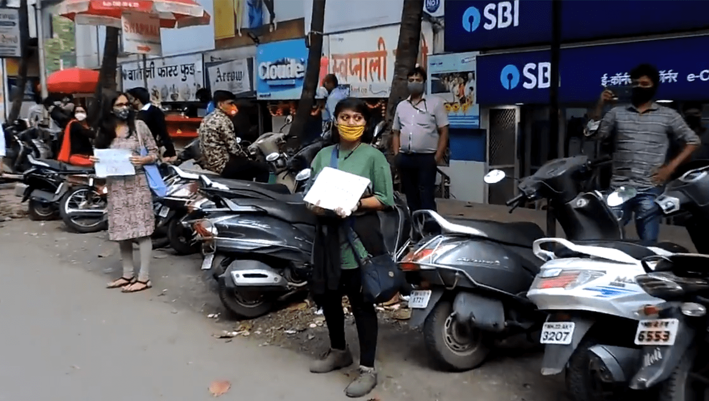 Activists protest outside an SBI
branch in Pune